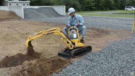 smallest digger|smallest excavator in the world.